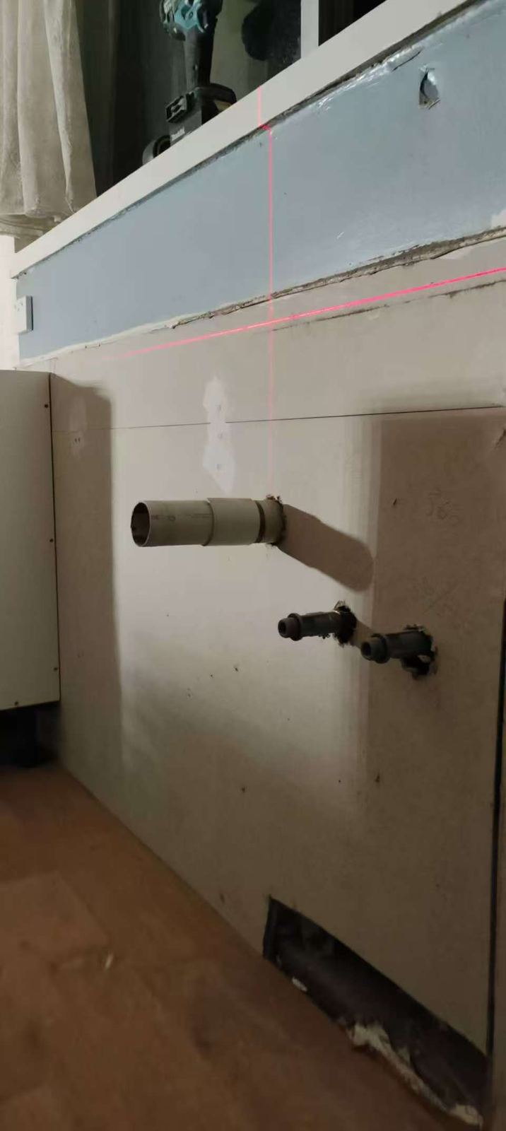 Under-sink pipework prepared for repair in a Melbourne property